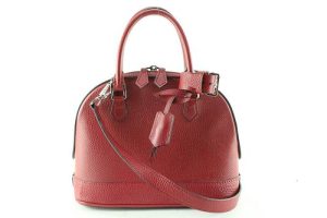 LOUIS VUITTON TAURILLON ALMA LEATHER HANDBAG